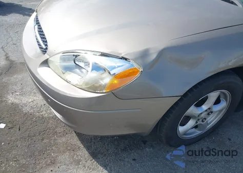 2002 Ford Taurus Se z USA, uszkodzony, nr VIN 1FAFP53U22A163527